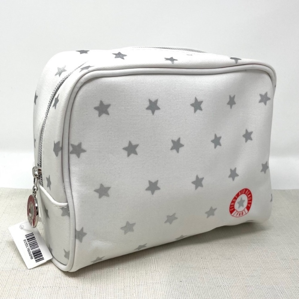 First Aid Beauty zippered pouch with stars